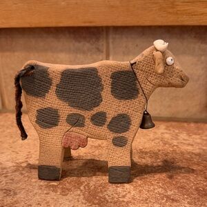 Clay cow decor